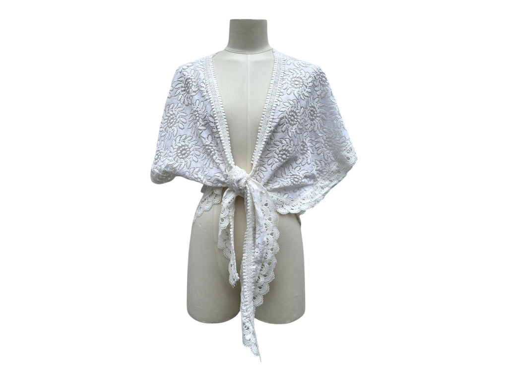Top pizzo bianco con maniche annodato sul davanti