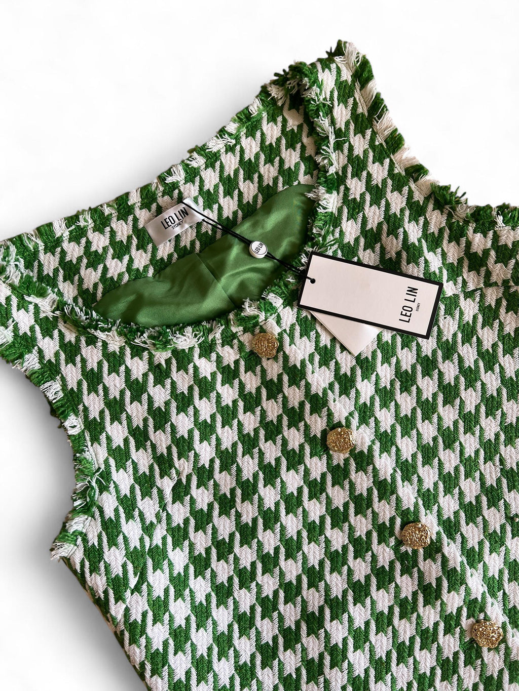 Mini abito Pied-de-Poule con fondo, scollo, giro manica e taschine sfrangiati