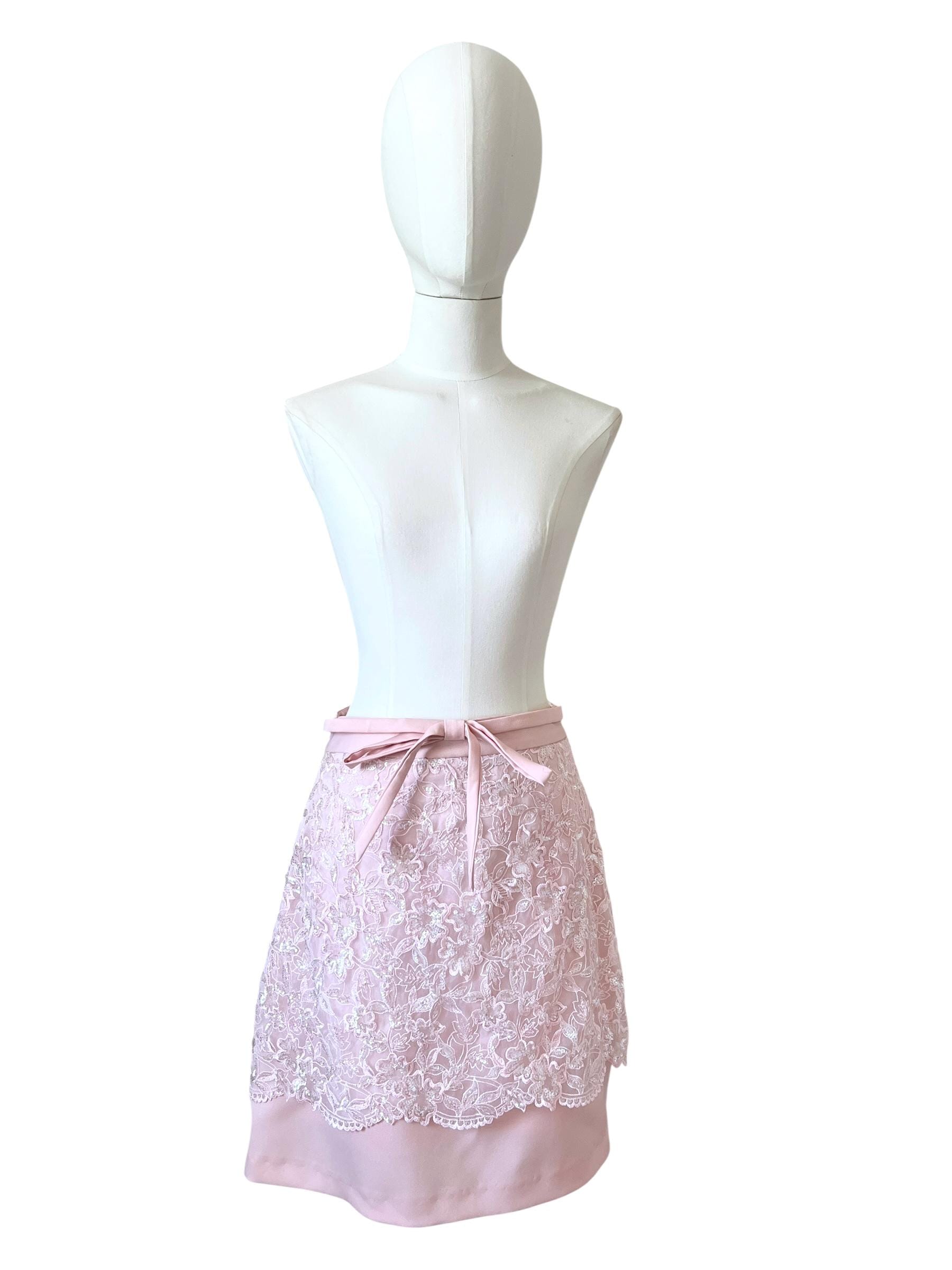 Mini gonna rosa con pizzo e paillettes