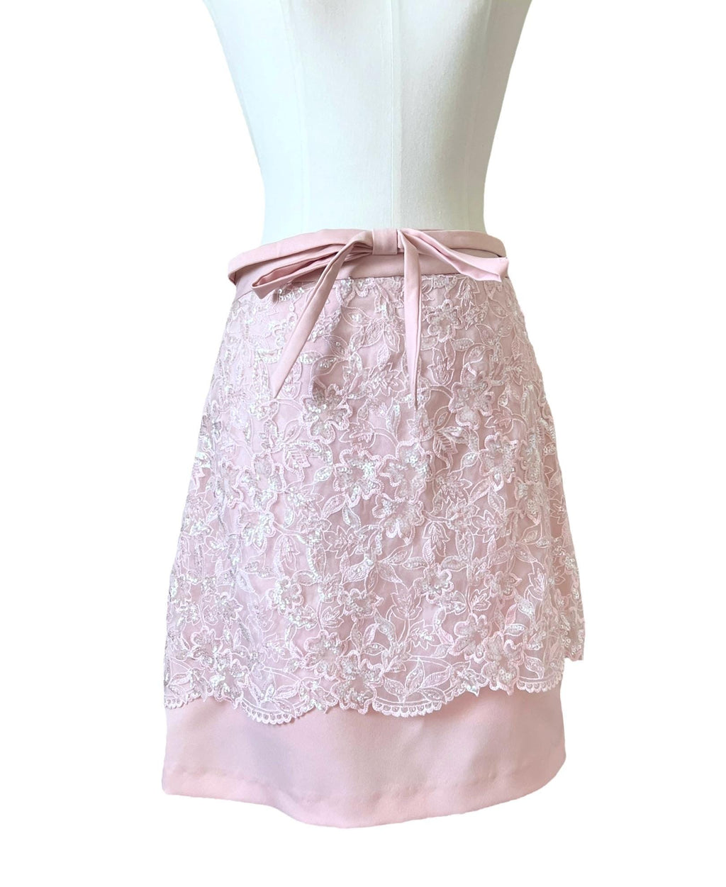 Mini gonna rosa con pizzo e paillettes