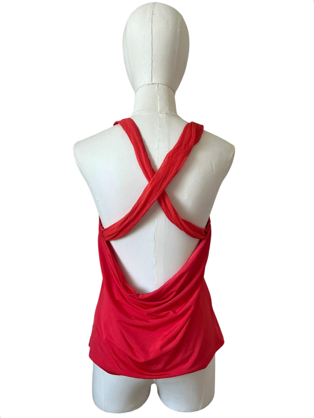 Top leggero smanicato con incrocio sul dietro