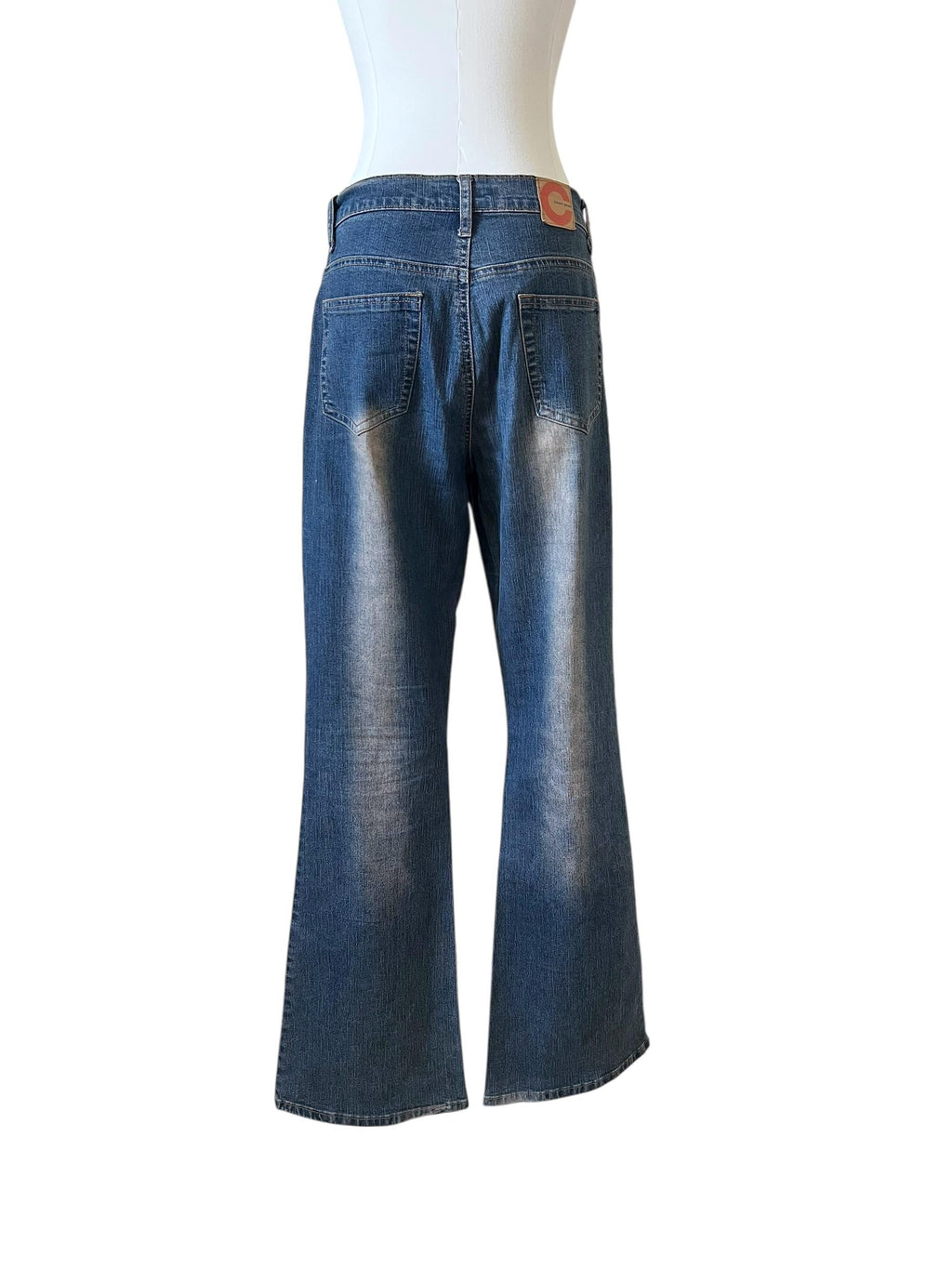 Jeans con gambe ricamate con pietre e perline