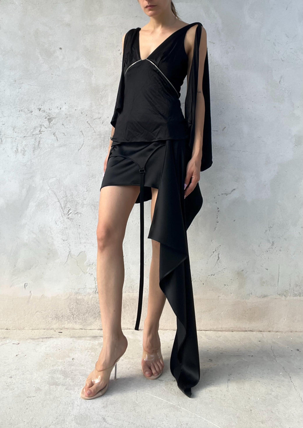 Top drappeggiato in jersey lucido