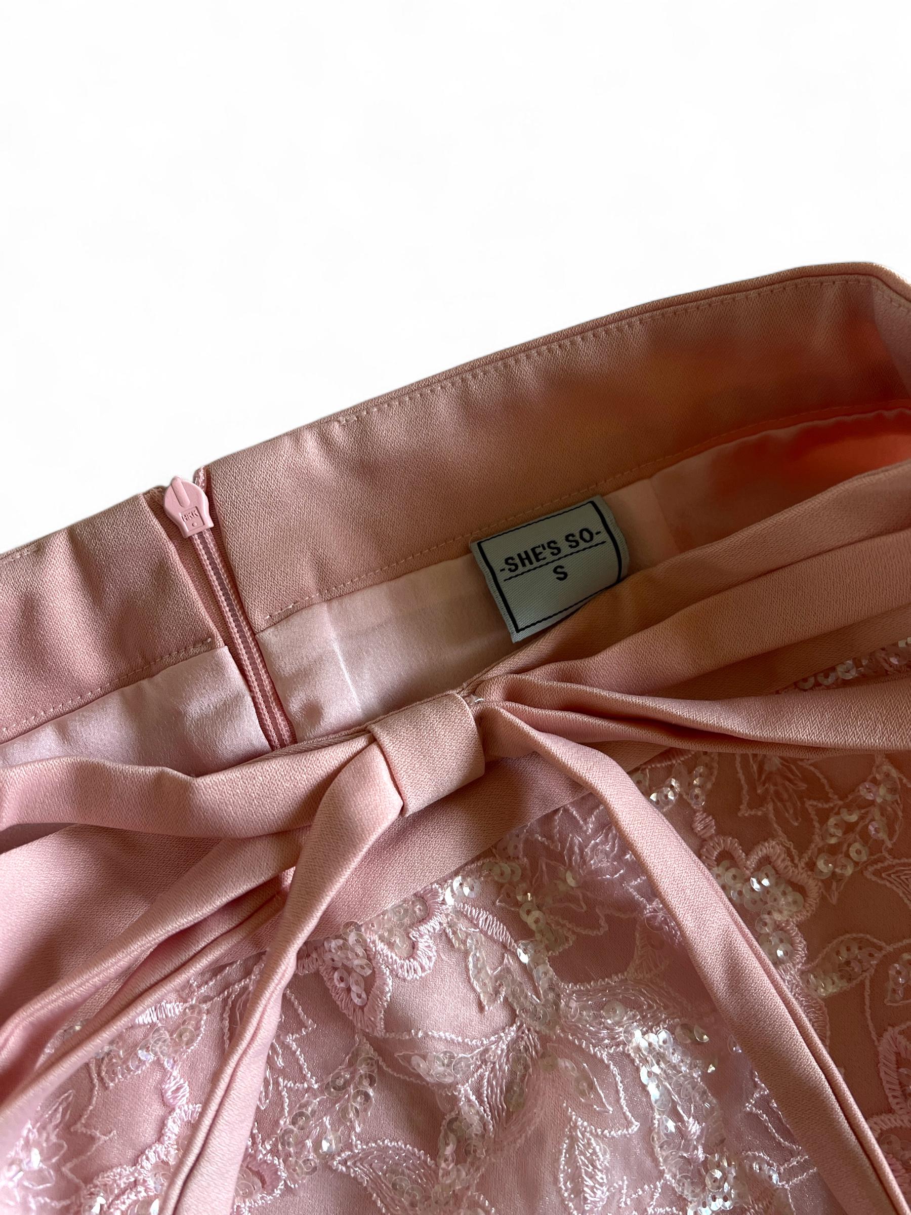 Mini gonna rosa con pizzo e paillettes