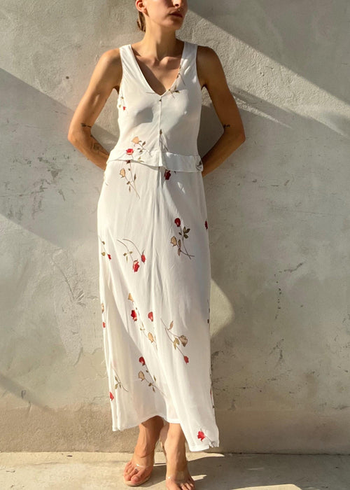Abito lungo bianco con fantasia rose rosse