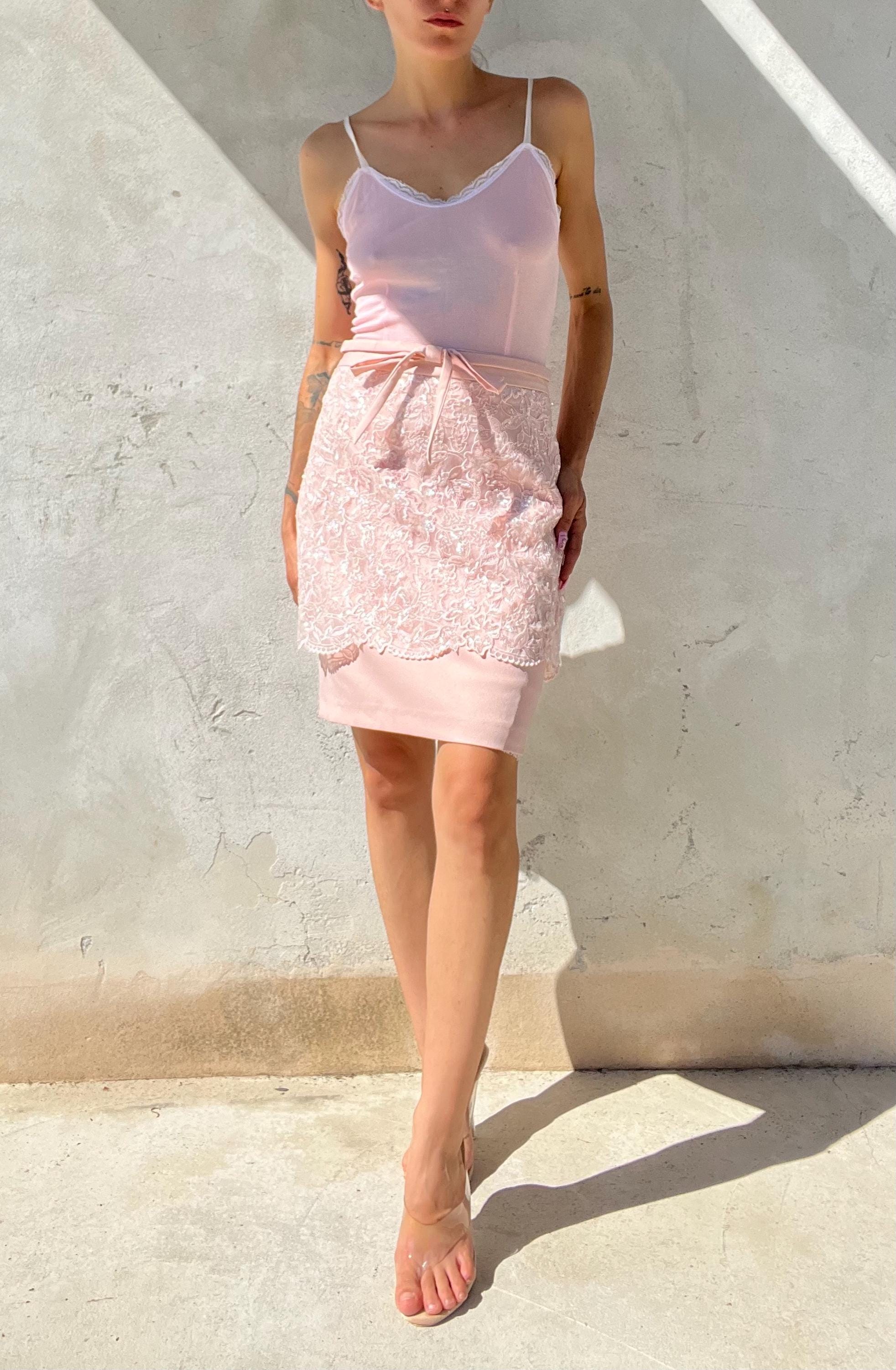 Mini gonna rosa con pizzo e paillettes