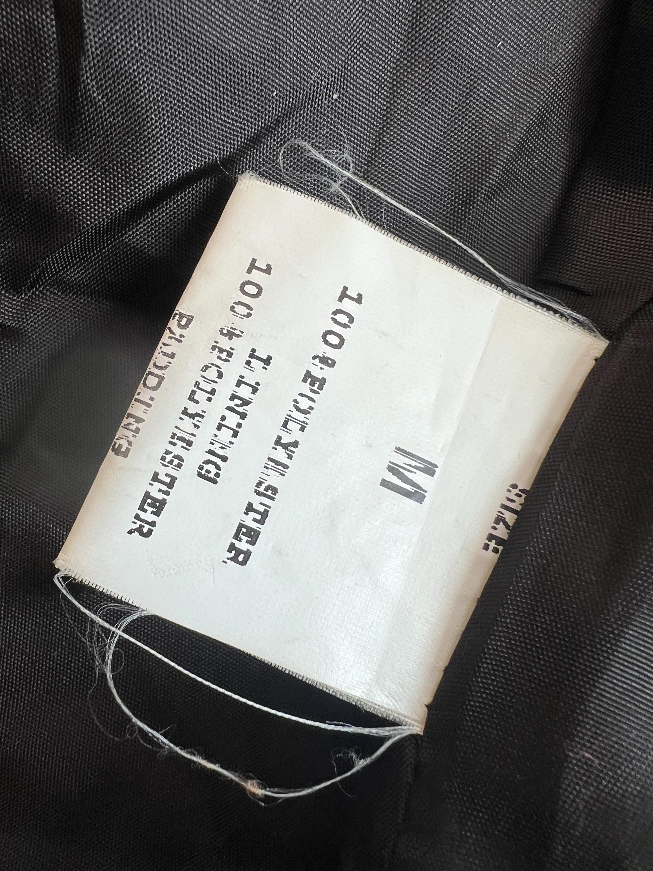 Cappotto trapuntato con profilo in pelliccia sintetica