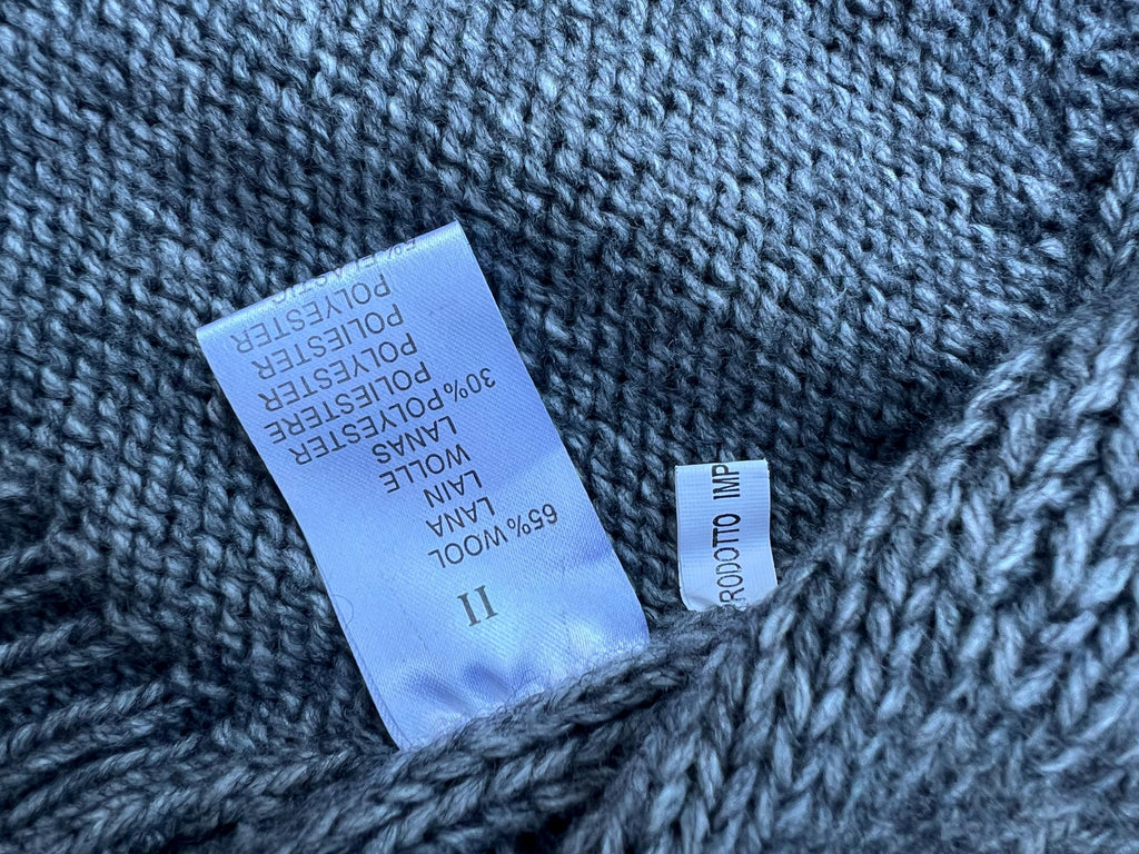 Cardigan grigio con frangie e bordo pelliccia sintetica