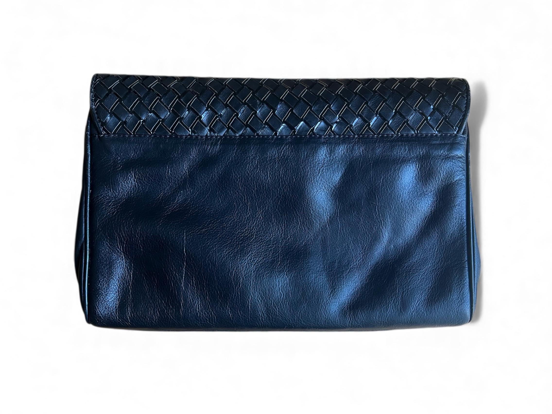 Pochette di pelle intrecciata