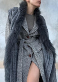 Cardigan grigio con frangie e bordo pelliccia sintetica