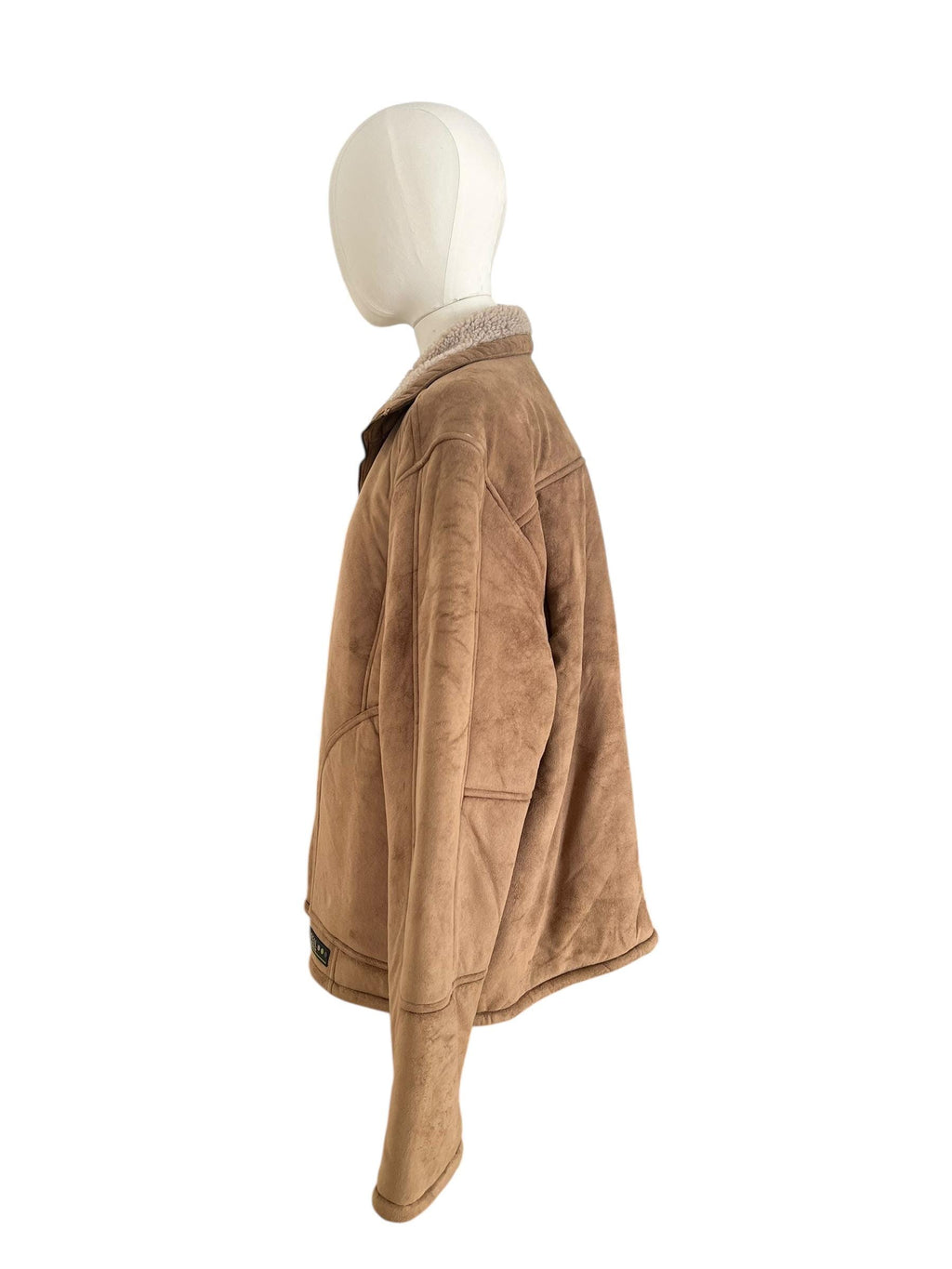 Shearling / Montone color marrone, zip frontale metallica e tasche arrotondate sul davanti