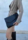 Pochette di pelle intrecciata