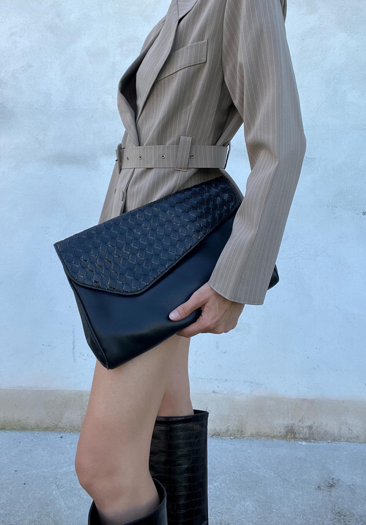 Pochette di pelle intrecciata