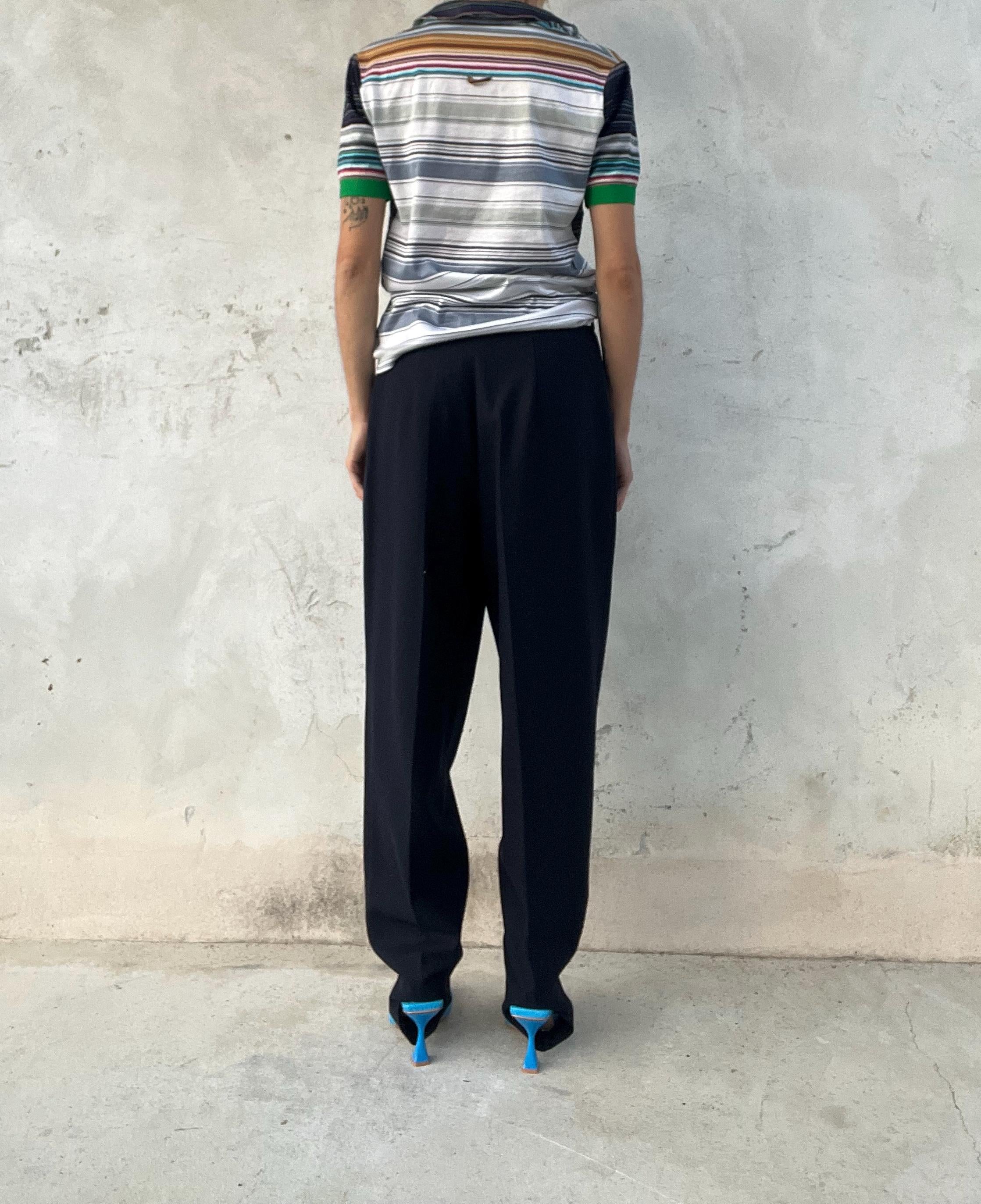 Pantaloni classici blu con ghetta