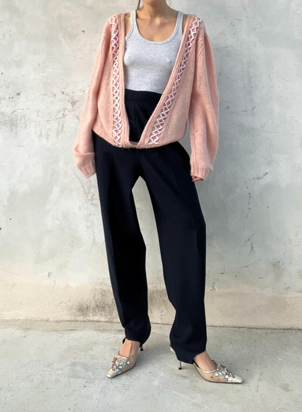 Cardigan vintage rosa con intreccio
