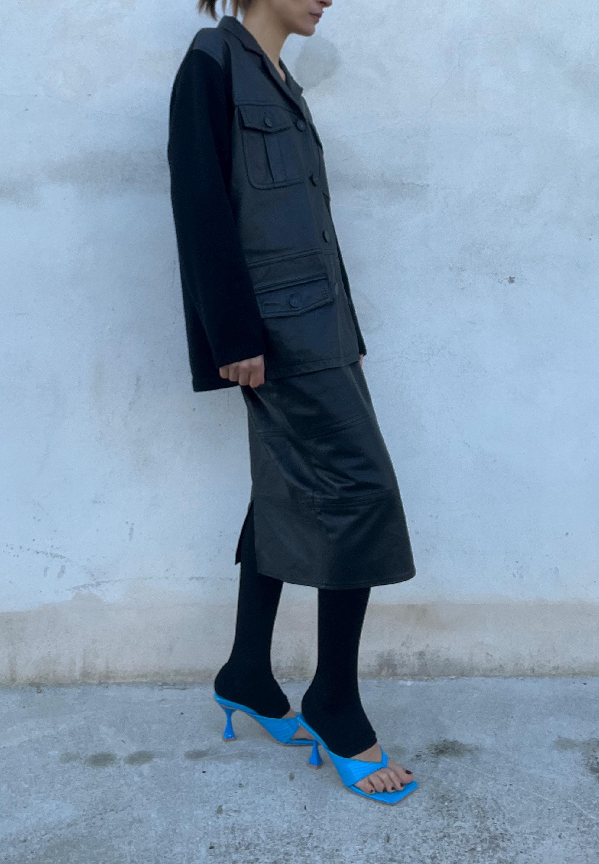 Giacca in pelle con inserti in maglia