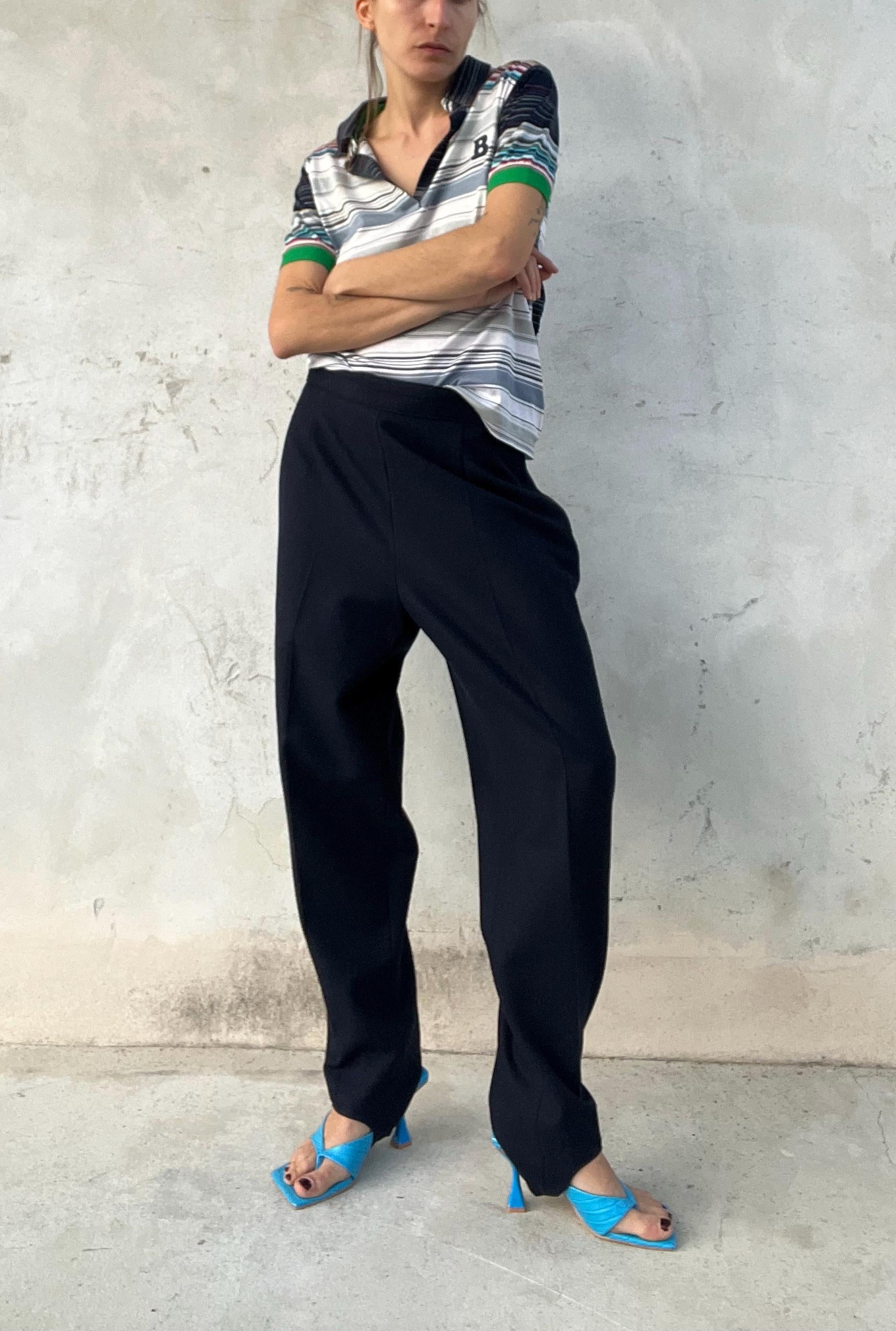 Pantaloni classici blu con ghetta