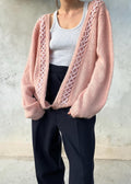 Cardigan vintage rosa con intreccio