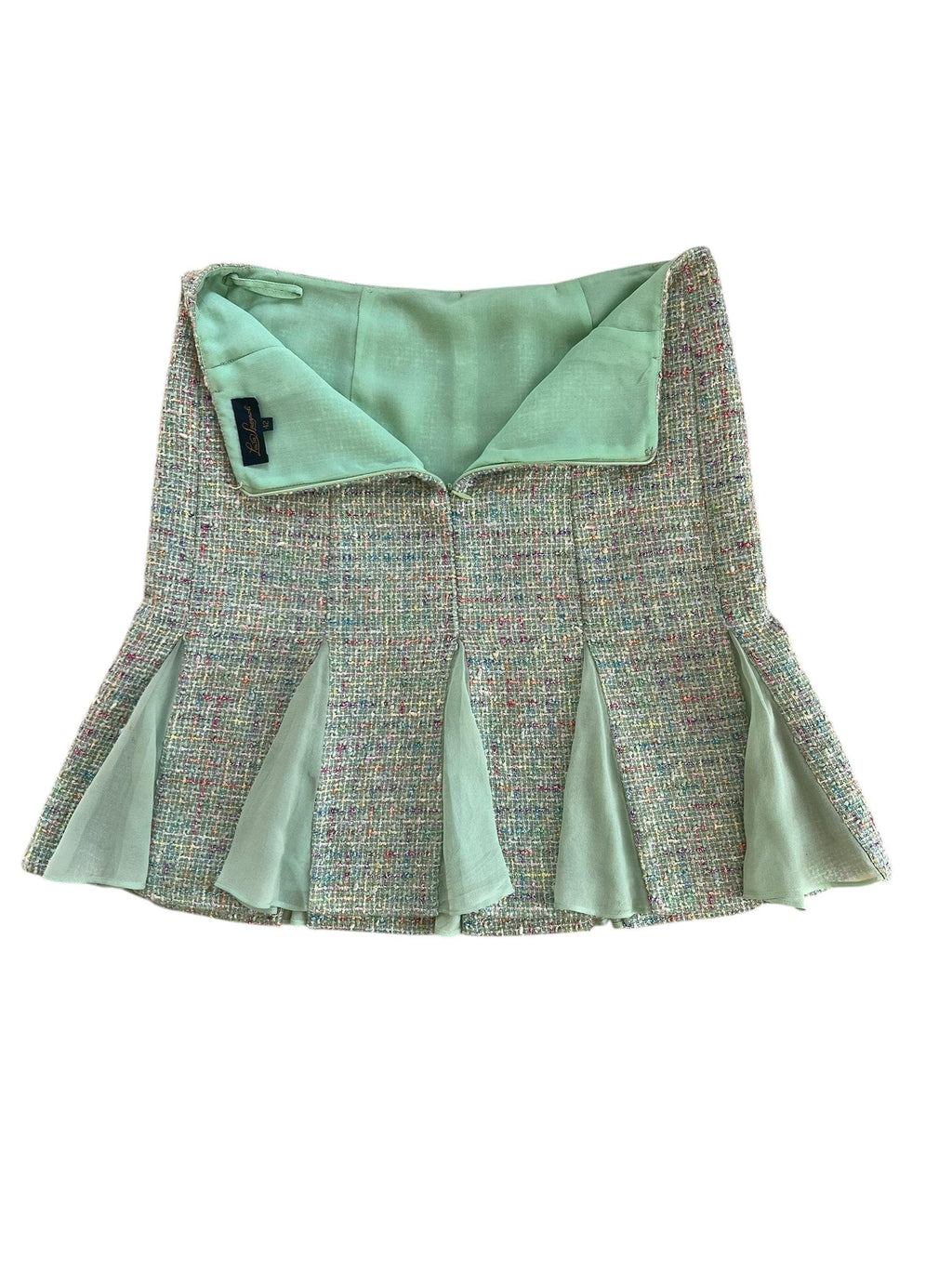Gonna bouclé verde chiaro con spicchi leggeri