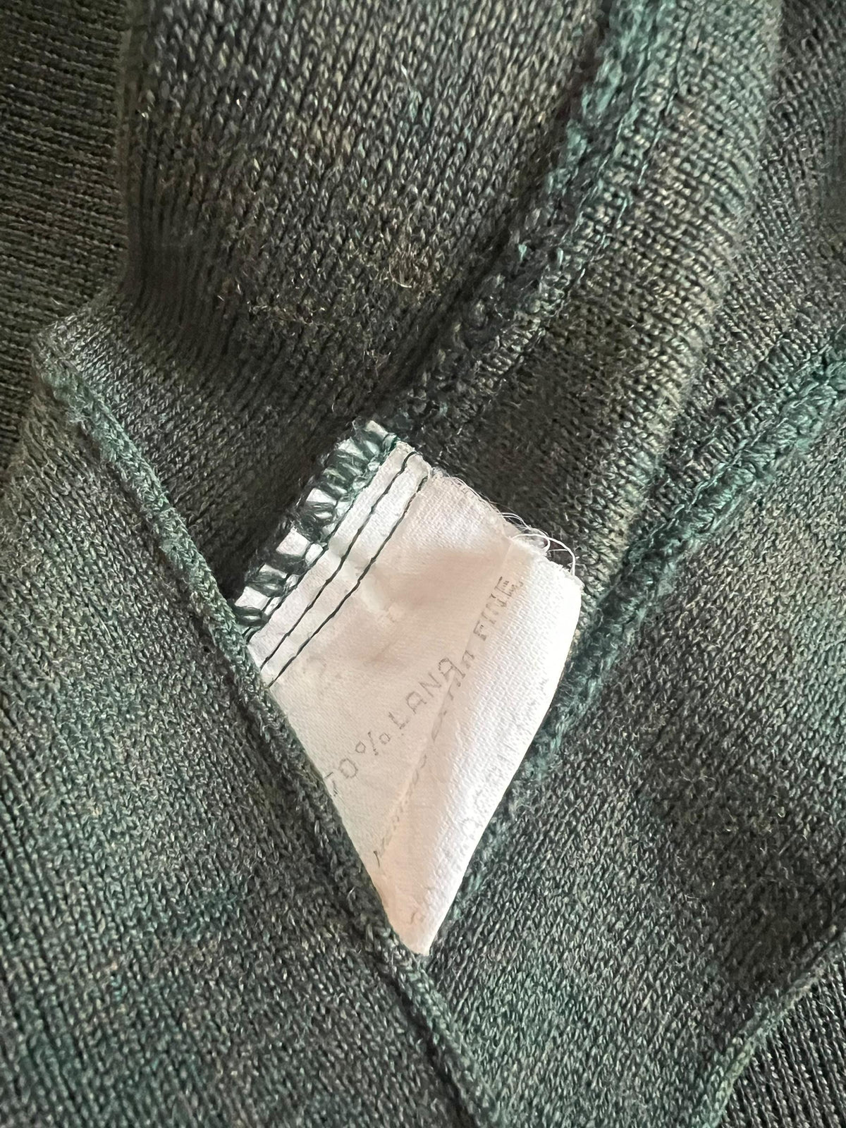 Gonna di misto lana verde scuro di maglia con spacchetto laterale