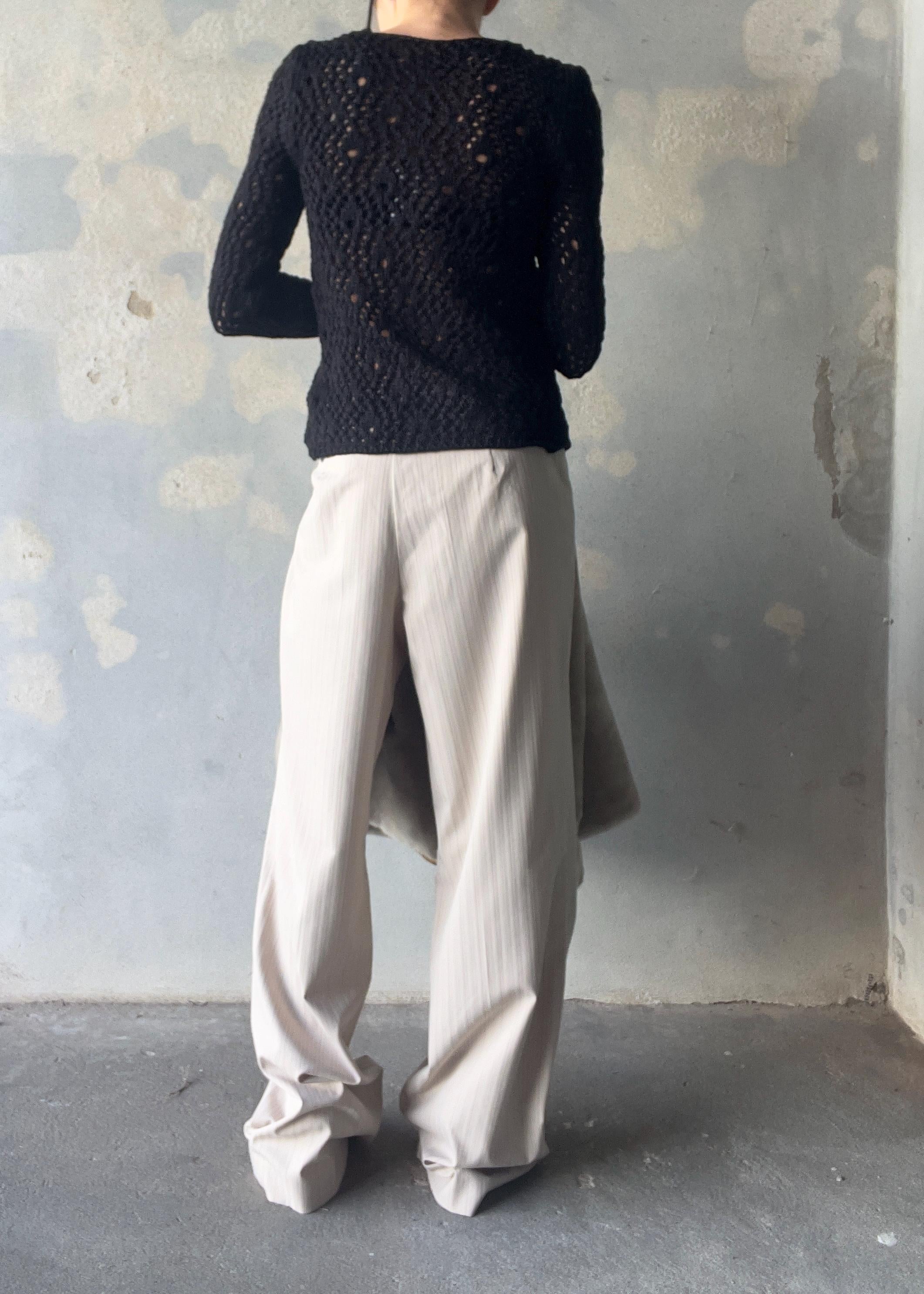 Pantaloni chiari gessati ampi