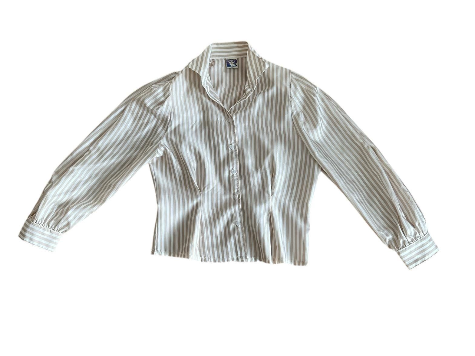 Camicia vintage e righe beige con un filo lurex
