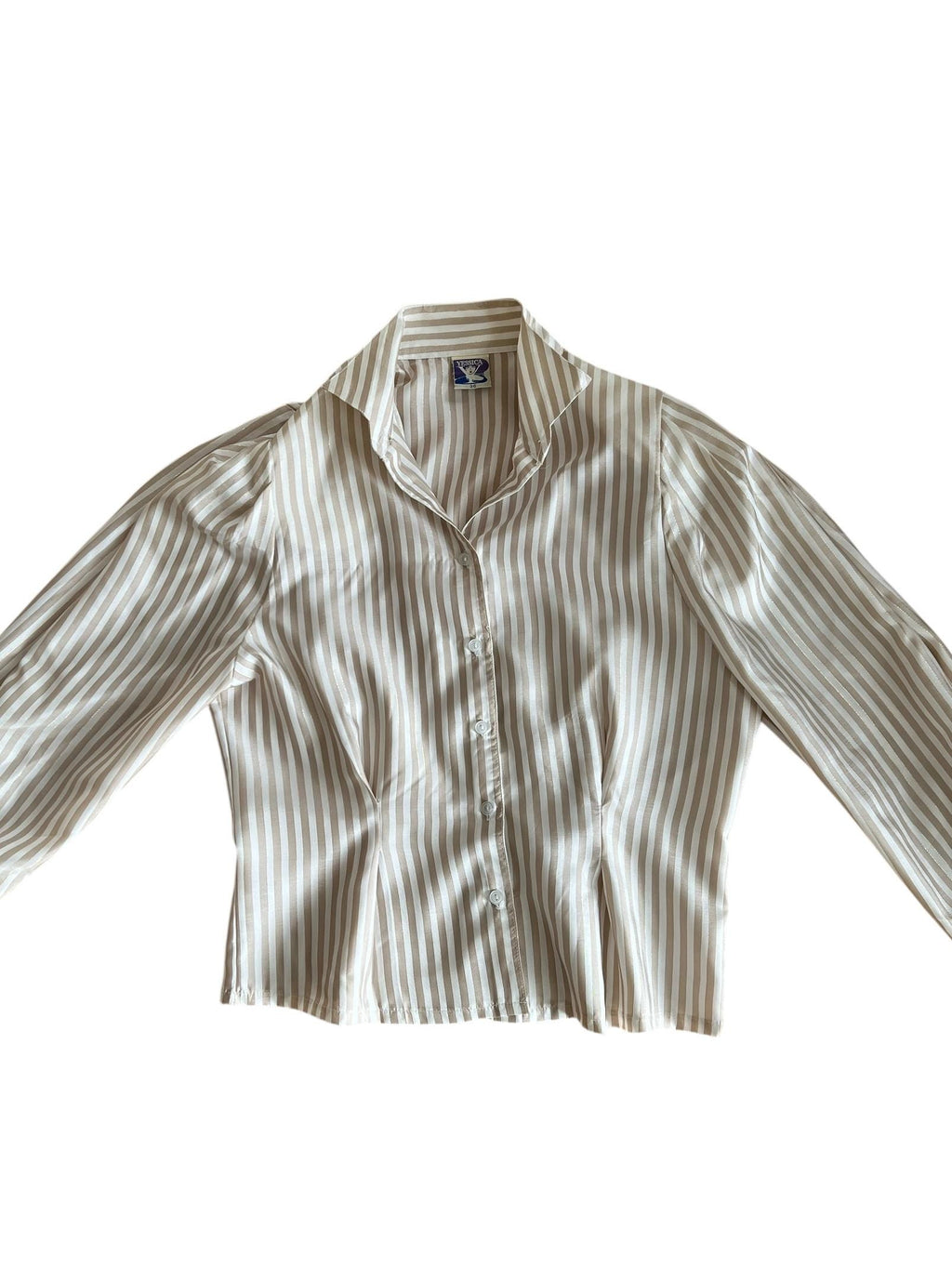 Camicia vintage e righe beige con un filo lurex