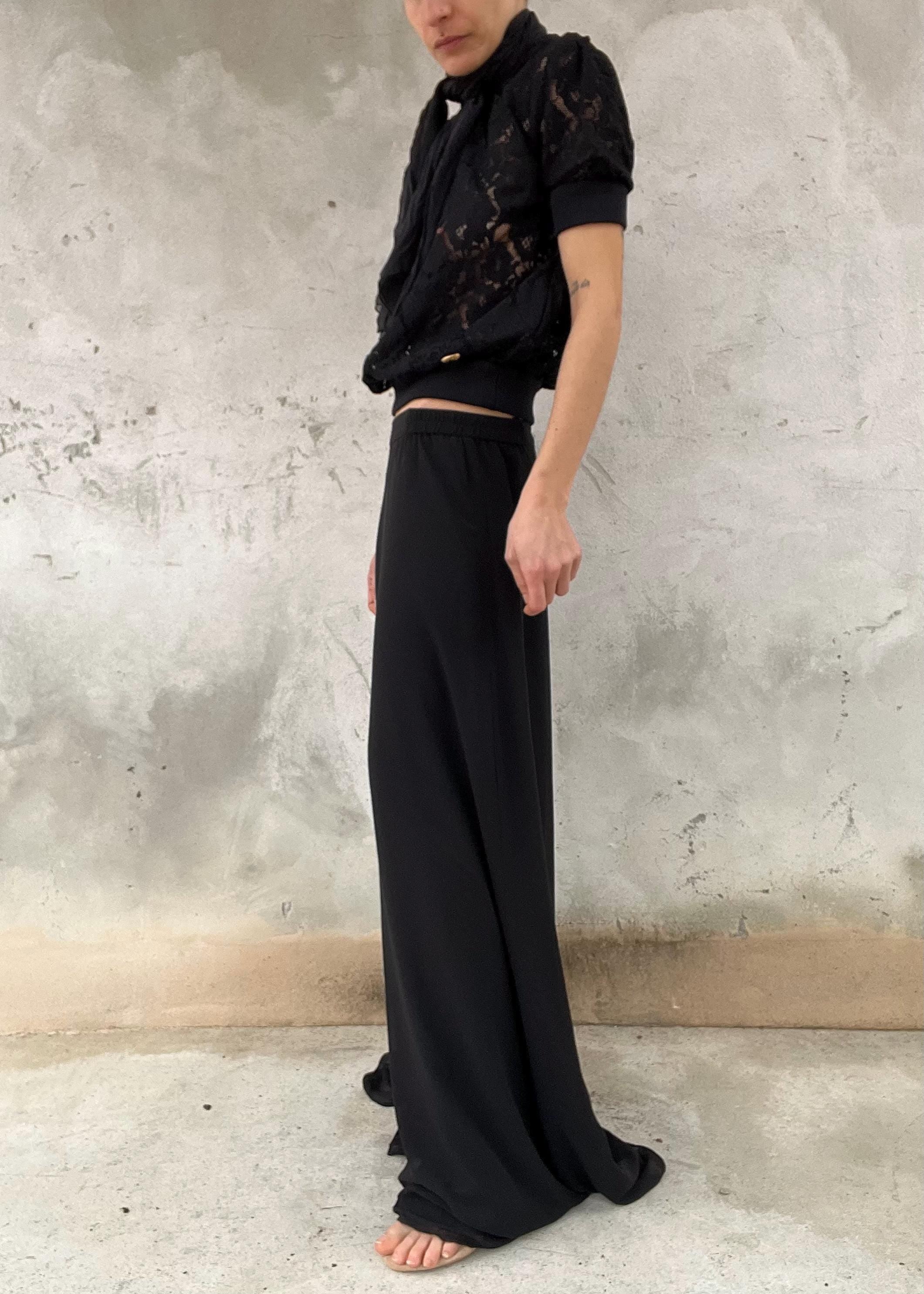 Pantaloni palazzo neri vintage fluidi a vita alta