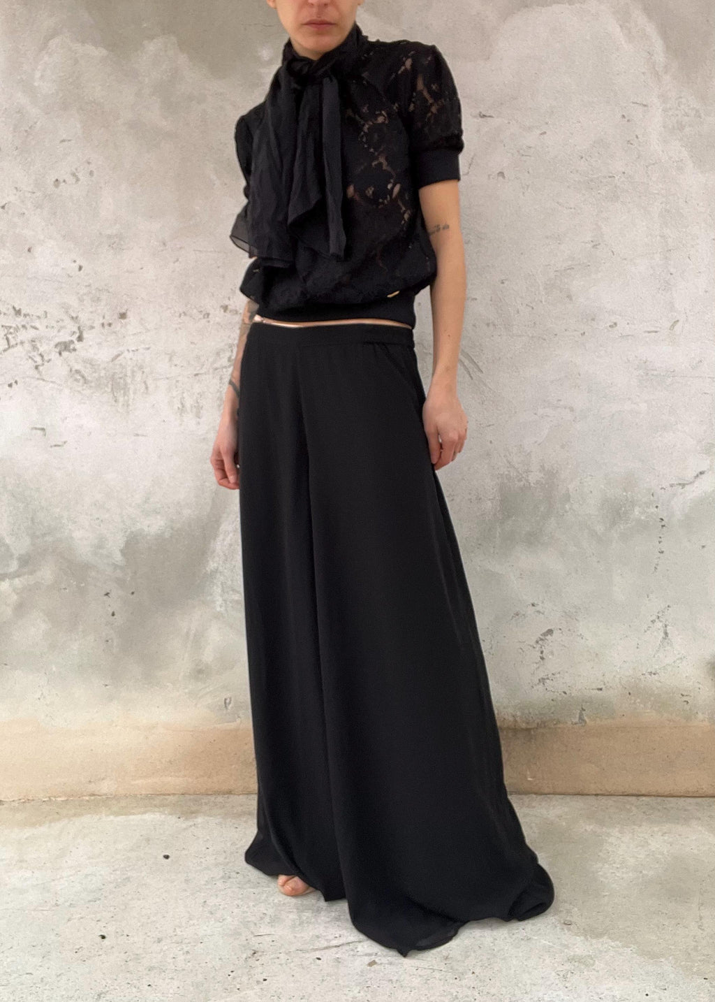 Pantaloni palazzo neri vintage fluidi a vita alta