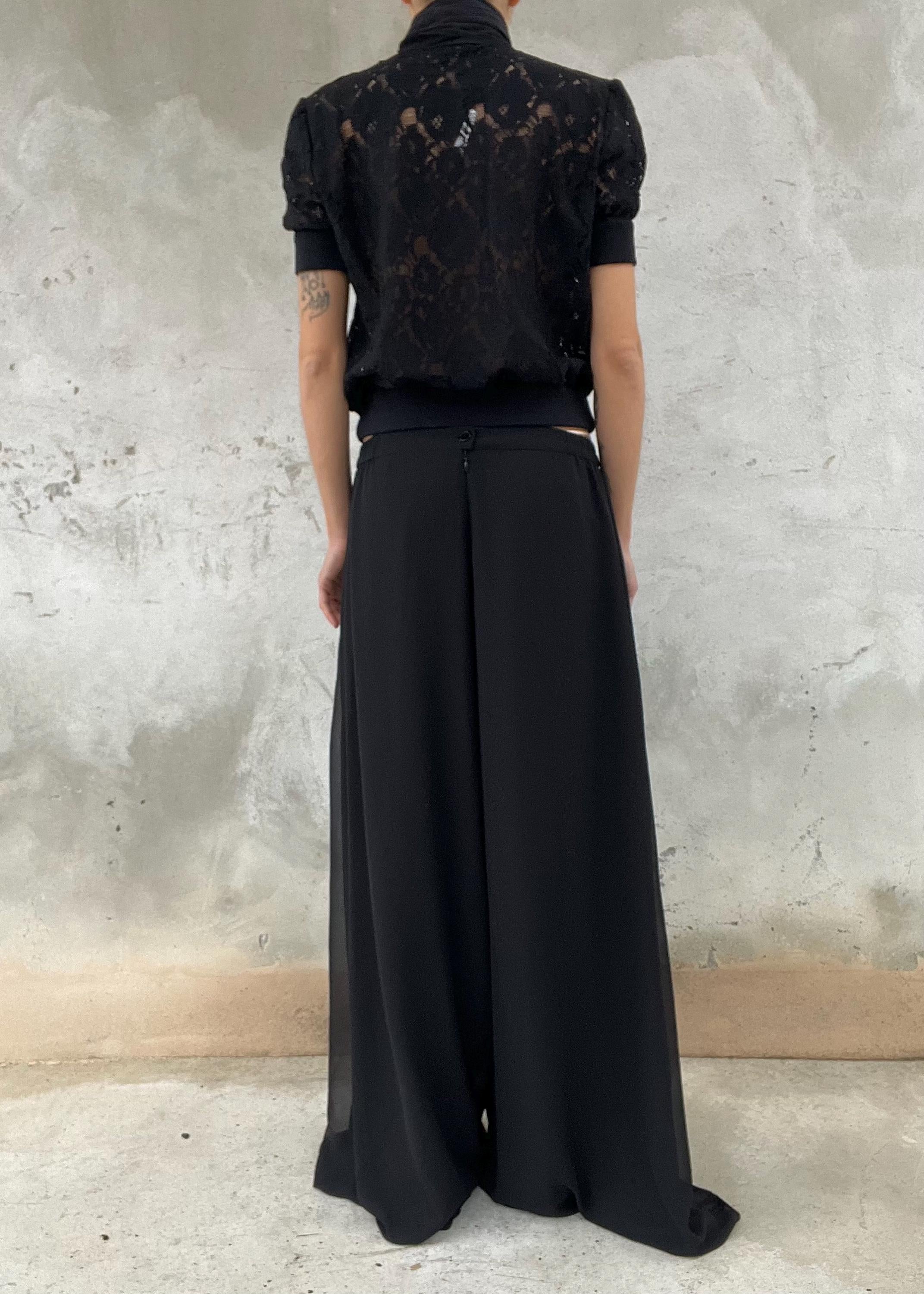 Pantaloni palazzo neri vintage fluidi a vita alta