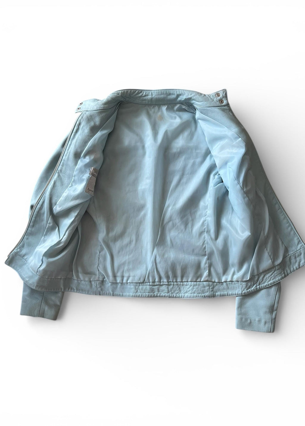 Giacca in vera pelle baby blue Y2K biker minimal con zip argento