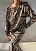 Completo vintage composto da top a maniche lunghe e gonna midi coordinata
