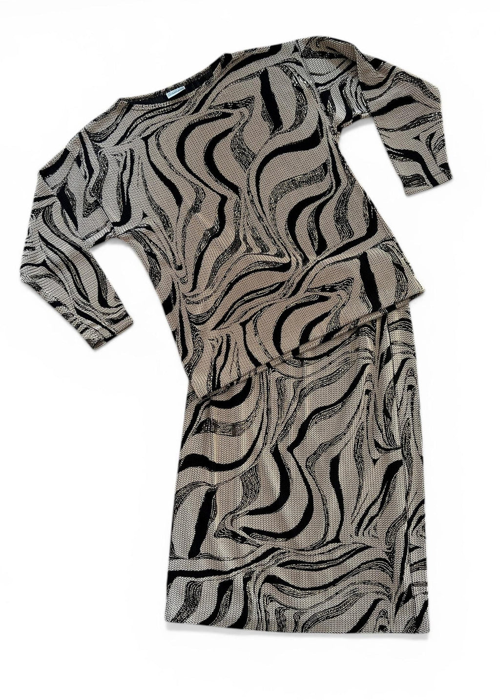 Completo vintage composto da top a maniche lunghe e gonna midi coordinata
