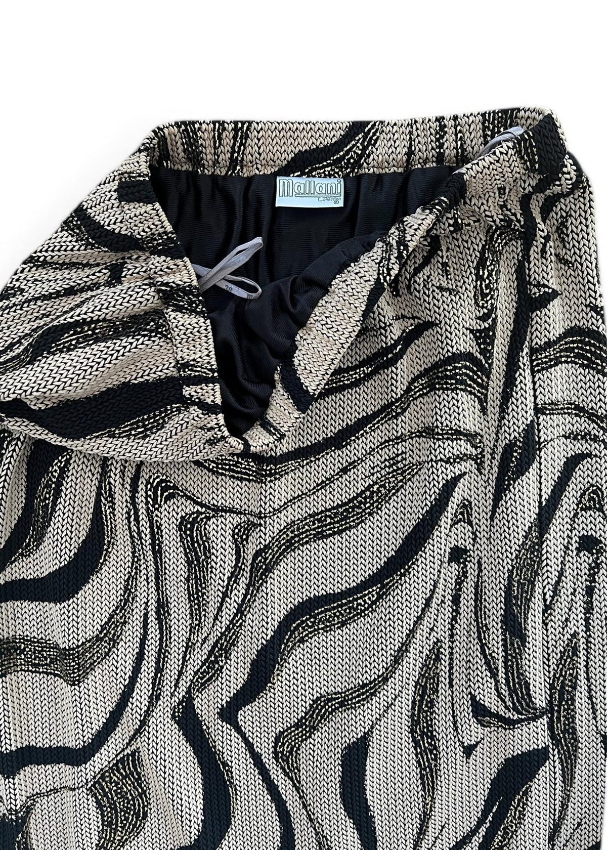 Completo vintage composto da top a maniche lunghe e gonna midi coordinata